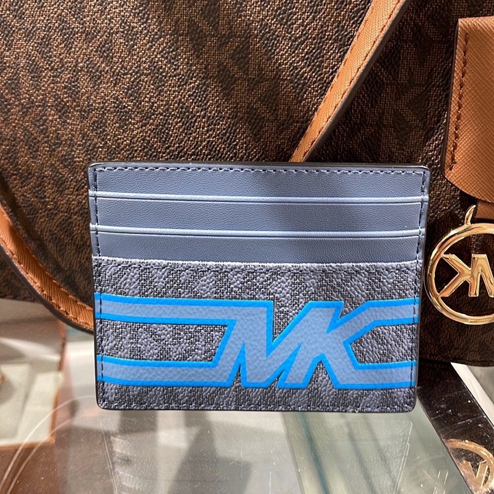 Michael Kors Cooper Graphic Logo Tall Card Case Denim Multi 36S3LCOD2B
NWT - Picture 4 of 16